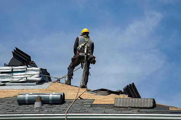 Professional Storm Damage Roof Repair technician working in Rossiter, PA